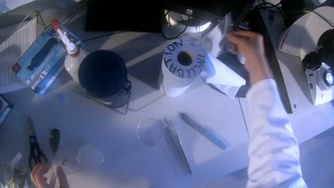 Scientist POV shot conducting experiments in the lab Stock Footage 117863308