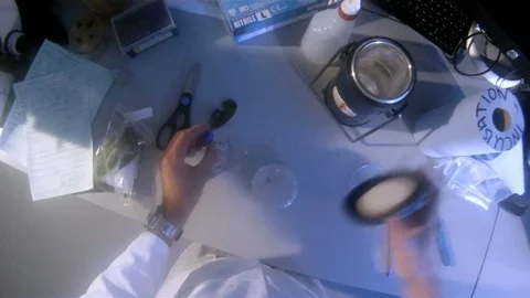 Scientist POV shot conducting experiments in the lab v4 Stock Footage 117863319