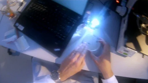 Scientist POV shot conducting experiments in the lab v7 Stock Footage 117863426
