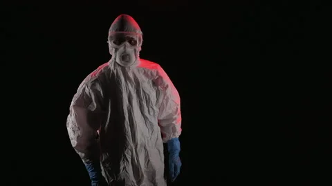Scientist in PPE pointing at the camera Stock Footage 299921571