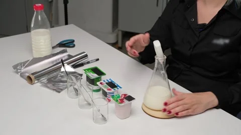 Scientist Preparing Milk Sample for Testing Stock Footage 306322802