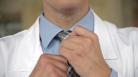 Scientist preparing or his tie Stock Footage 43749976