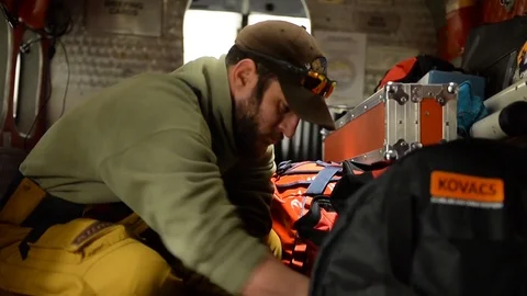 Scientist preparing to survey ice flow in Beaufort Sea, Arctic Circle Stock Footage 86895786