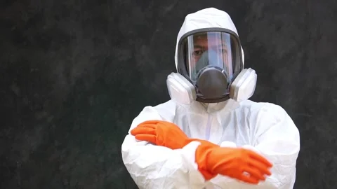 Scientist in a protective clothes standing together with arms crossed Stock Footage 147145569
