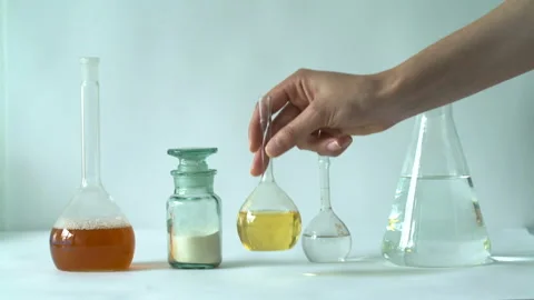 Scientist put the flasks on the table, the chemical laboratory Stock Footage 91075961