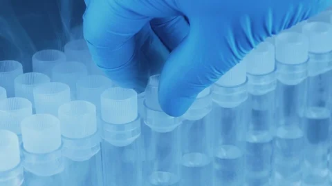 Scientist Puts Back Test Tube Stock Footage 105880248