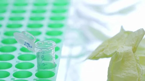 Scientist putting samples in laboratory sample tube 4k Video stock 75064940