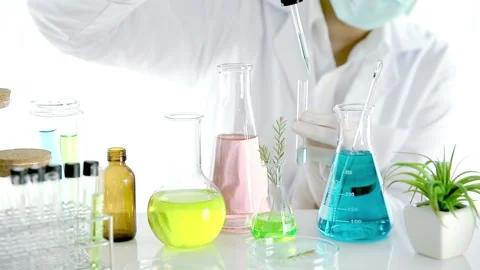 The scientist is sampling a chemical extract from organic natural Stock Footage 131485051