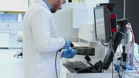 Scientist scanning samples in modern laboratory Stock Footage 296885996
