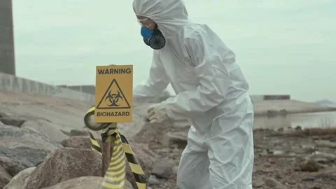 Scientist Secures Hazard Zone After Environmental Disaster in Slow Motion Stock Footage 320090914