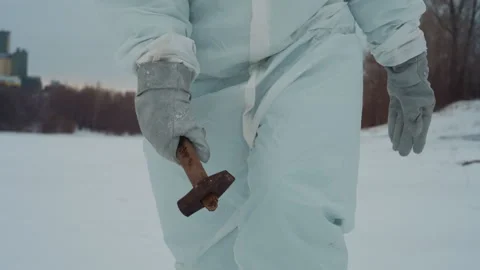 Scientist on snow. Rusted cross in cold landscape. Researcher moves across icy Video stock 342740830