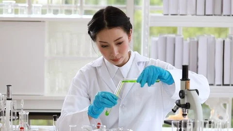 Scientist student mixing substances in test tube. Stock Footage 101932266