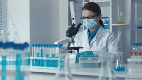 The scientist studies the interaction of drugs with molecules in the body Stock Footage 257621064