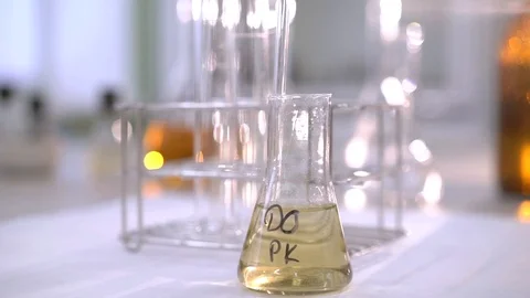 Scientist takes reagent samples with a pipette Stock Footage 115101564