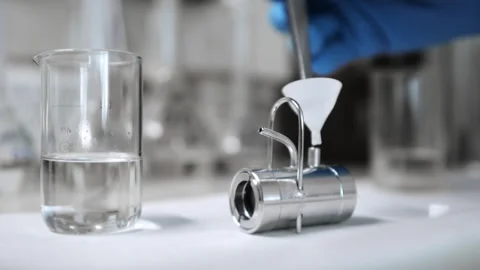 A scientist takes water samples for quality control. Stock Footage 281701942