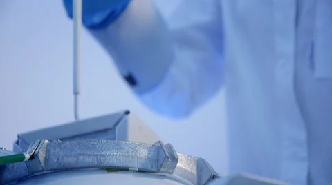 Scientist taking frozen samples of cells Stock Footage 47202225