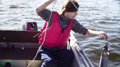 A scientist taking sample of water from lake Video stock 93740836