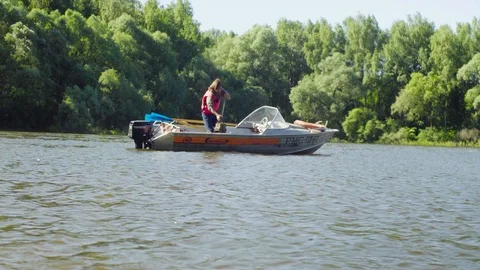 The scientist taking silt from the bottom of the lake Video stock 93744261
