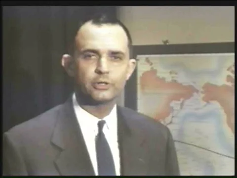 A scientist talks about the phenomena produced by nuclear detonation in 1958. Stock Footage 75269735
