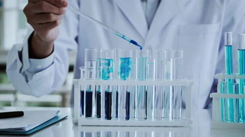Scientist test for Covid-19 or Corona virus By using science tubes Stock Footage 137522045