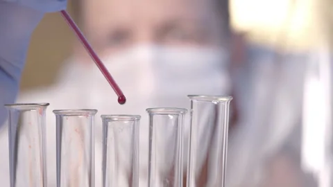 Scientist with a test tube. Close up Video stock 142891129