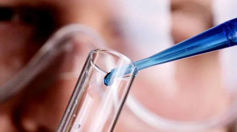 Scientist with test tube 스톡 동영상 23330745