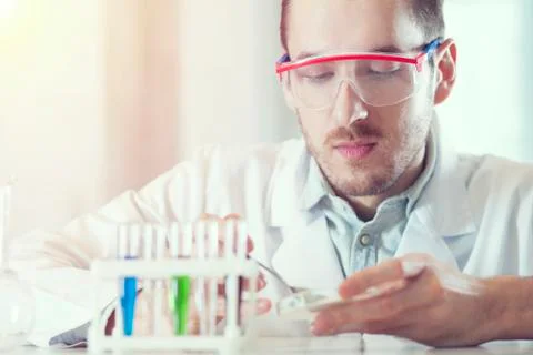 Scientist with test tubes Stock Photos
