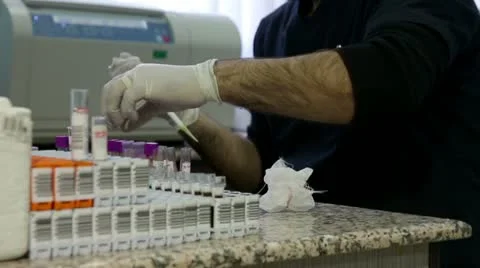 Scientist testing blood samples in laboratory Video stock 23342229