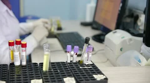 Scientist testing blood samples in laboratory Stock Footage 23342321