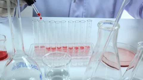 Scientist testing DNA biochemistry in laboratory. health care concept. Stock Footage 123821179