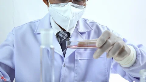 Scientist testing DNA biochemistry in laboratory. health care concept. Stock Footage 123821926