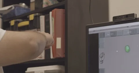 Scientist testing hand movement detection system Stock Footage 104345044