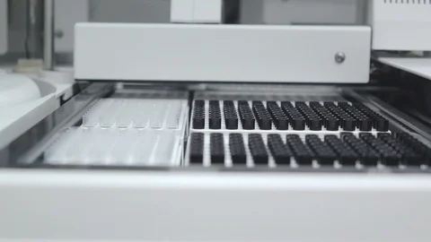 Scientist testing in laboratory for analysis or researching Stock Footage 90738841