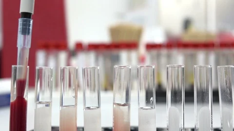Scientist testing in laboratory for analysis or researching Stock Footage 90738929