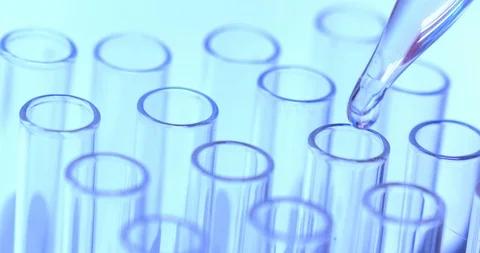 Scientist testing in laboratory for analysis or researching Stock Footage 94351383