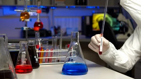 Scientist testing sample for Coronavirus Video stock 127562193