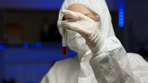 Scientist testing sample for COVID-19 Stock Footage 127560550