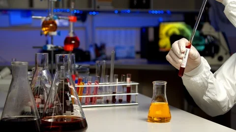 Scientist testing sample for COVID-19 Video stock 127565448