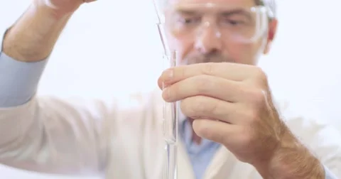 A scientist testing the water hardness - the water is soft and good for use 스톡 동영상 48984056