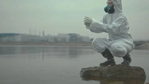 Scientist Tests Toxic River Water After Environmental Disaster Stock Footage 320503826