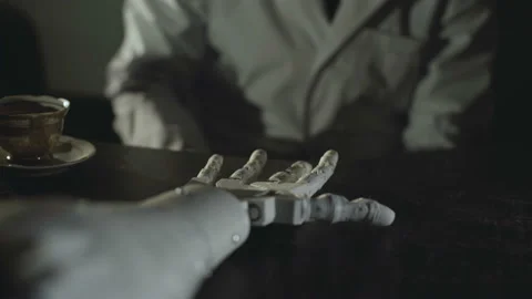 The scientist trains robotic hand to perform a clamp of a cup. 4K Vídeo Stock 92966243