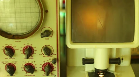 Scientist turning dials turn knobs Stock Footage 24334022