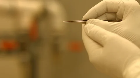 Scientist with tweezers Stock Footage 106899562