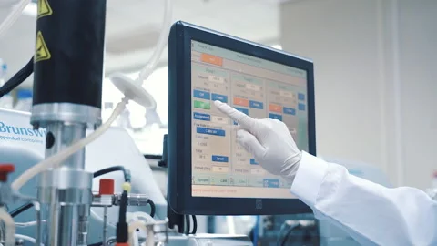 Scientist use laboratory machine by touch screen close up Stock-Footage 158916282