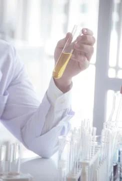 Scientist use microscope in the laboratory for research anti virus or vaccine of Stock Photos