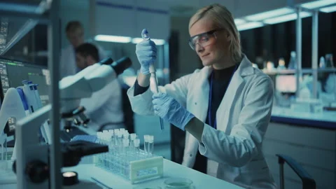 Scientist Use Pipette in Laboratory Stock Footage 142225182