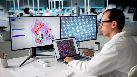 Scientist Uses Computer In Lab For Protein Drug Analysis Stock Footage 334531568