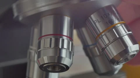 A scientist uses a microscope in the laboratory. Stock Footage 220337865