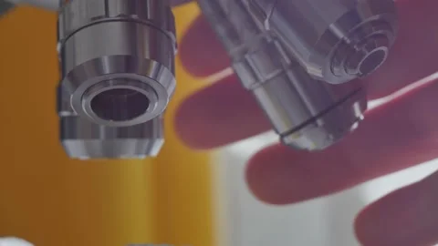 A scientist uses a microscope in the laboratory. Stock Footage 220337891