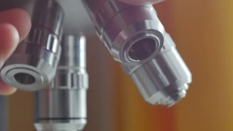 A scientist uses a microscope in the laboratory. Stock Footage 220337895